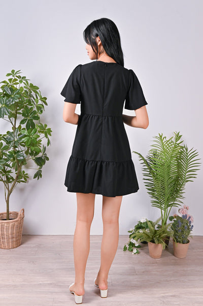 All Would Envy One Piece ANSA FLOUNCE DRESS-ROMPER IN BLACK